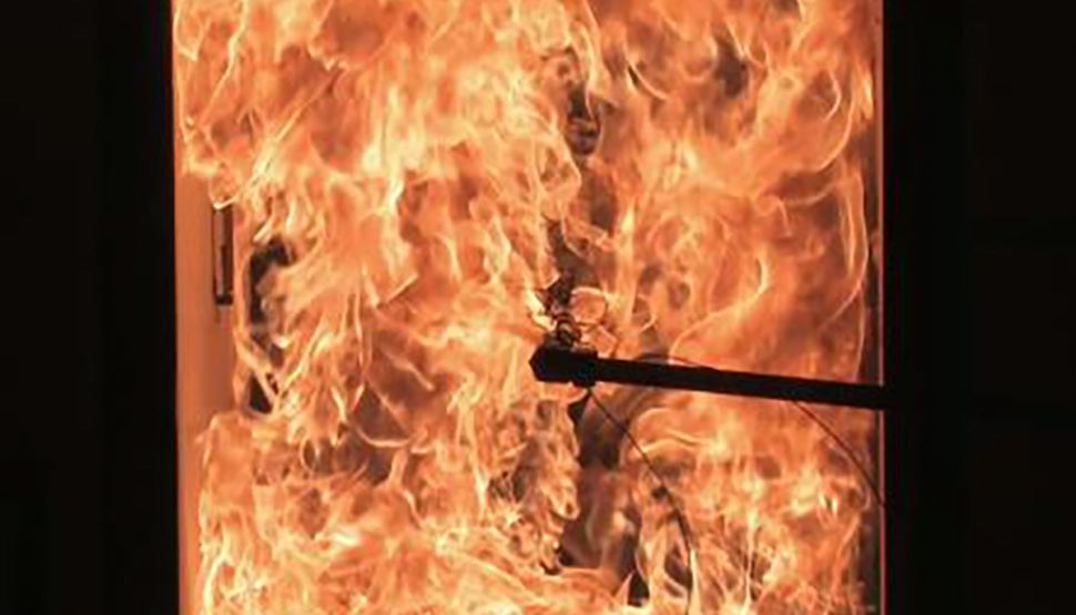 A fire safe shutoff valve is exposed to a 125 kW/m2 propane burner during research conducted at the FM Global Research Campus in West Glocester, Rhode Island, USA